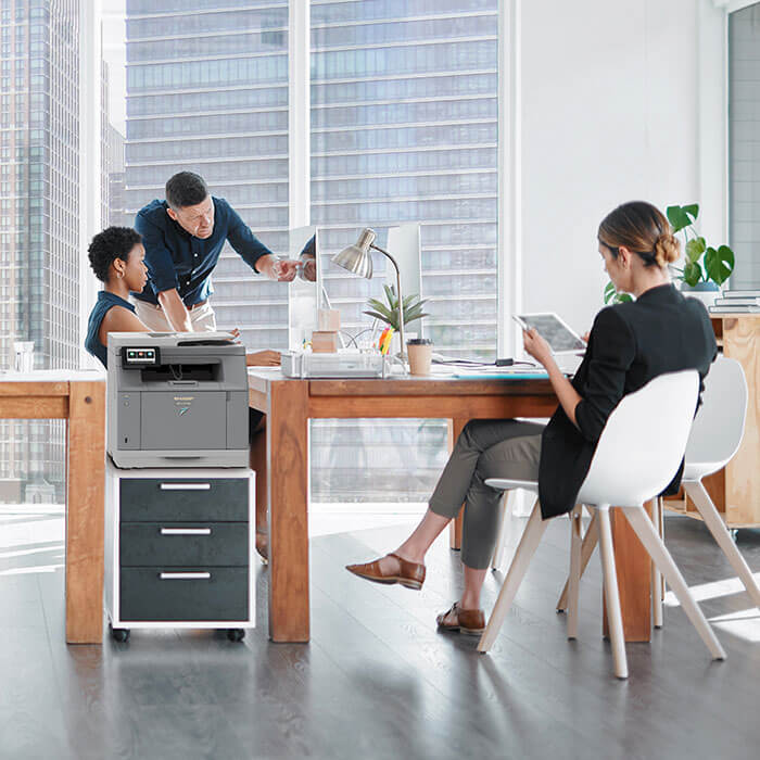 workers in the office around their desks